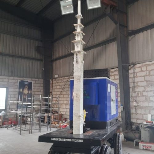Mobile Lighting Tower with four lights, & trolley.